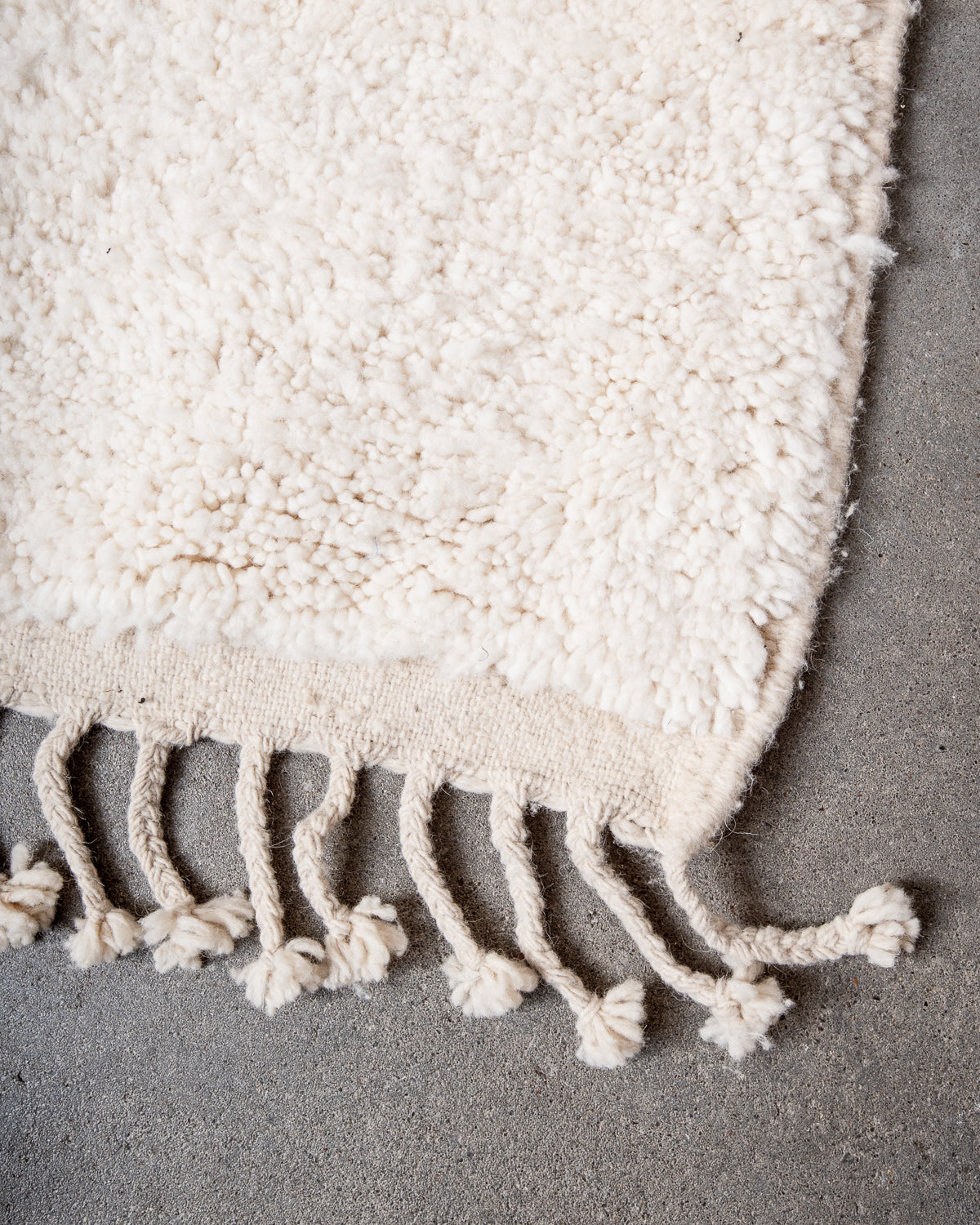 Modern, designer, handcrafted Berber rug from Morocco. Beniourain carpet with beautiful colours and patterns and fluffy wool texture.